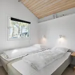 Three-bedroom In Hébergement de vacances *